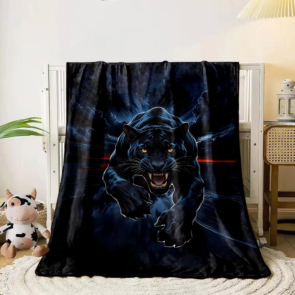 

A fierce black panther leaps forward against a dark, stormy background. for all seasons blanket lunch break throw gift 80cm x 120cm