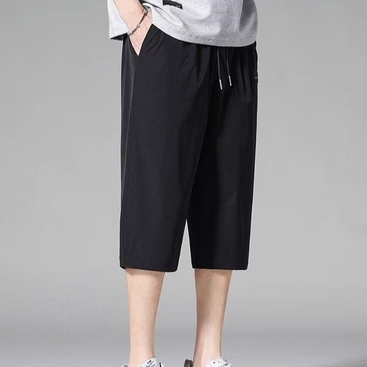 

Мужские быстросохнущие укороченные летние шорты Ice Silk - свободный крой, модные, карман на молнии, повседневные, большой размер XL чёрный