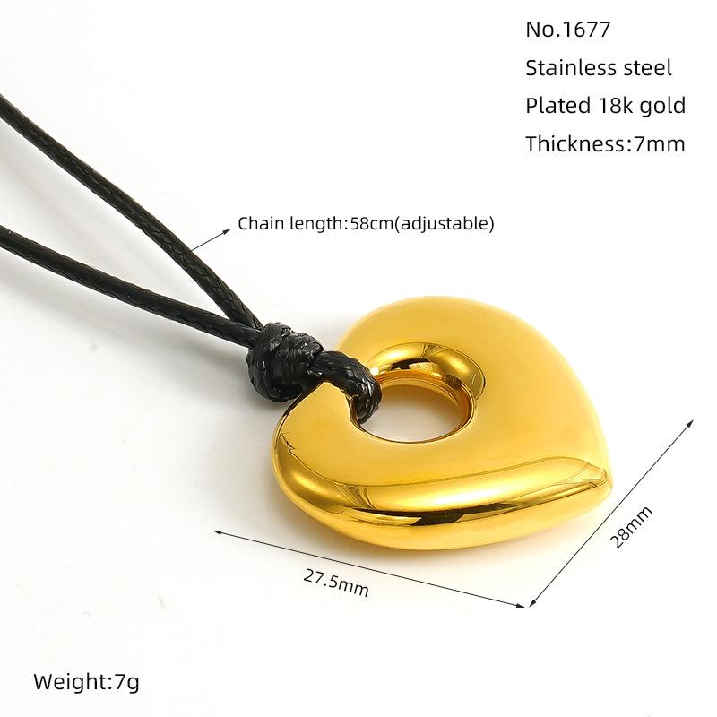 

Новое ожерелье из нержавеющей стали с черным вощеным шнуром, с полым кулоном в виде сердца, роскошное, высококлассное, нишевое золотой