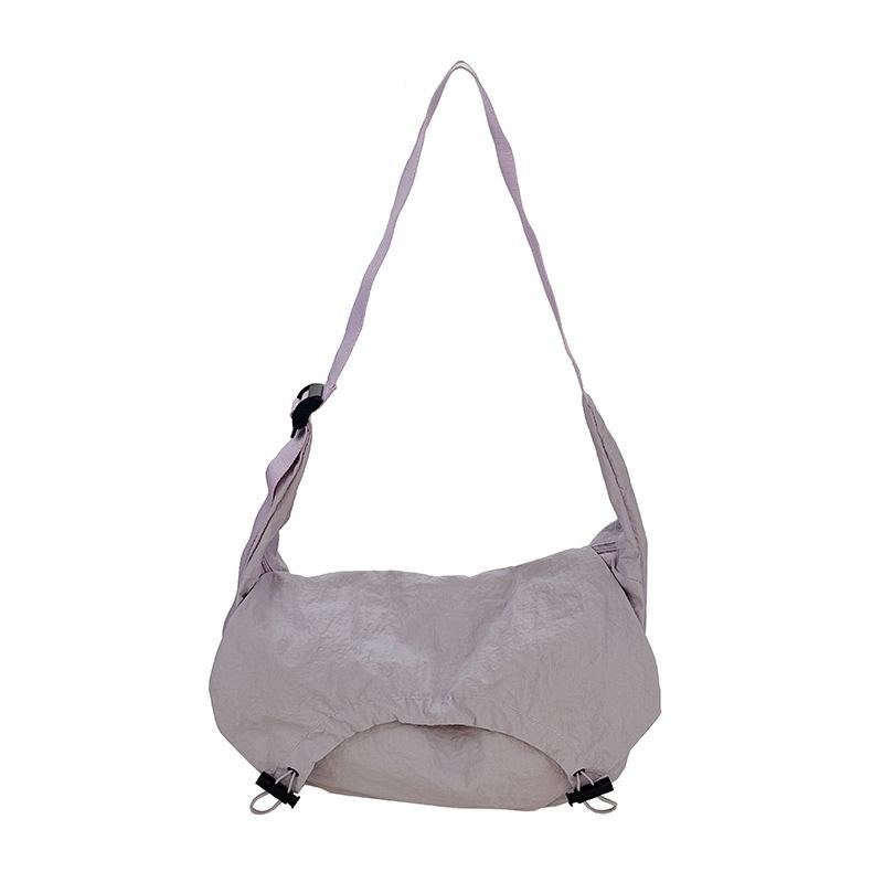 

Niche design tooling style dumpling bag women s high-end feeling foreign style shoulder bag sports versatile hand bag фиолетовый