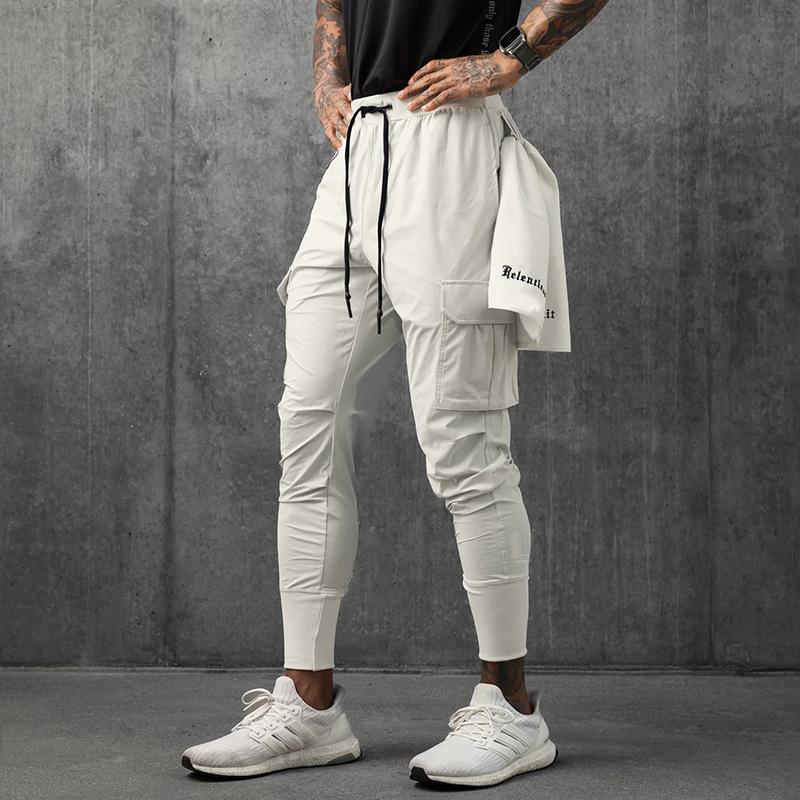 Pantalon de survêtement tissé athlétique décontracté pour homme pour la course et l'entraînement