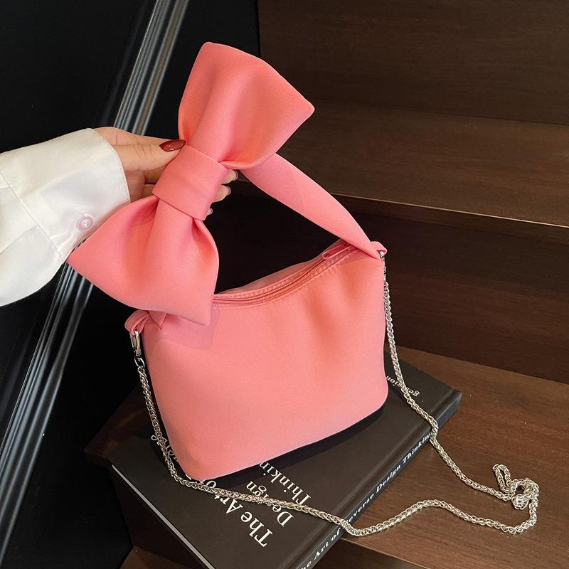 

Cute bow small bag women s 2025 new Mori sweet fashion niche hand carry chain crossbody dumpling bag рожевий
