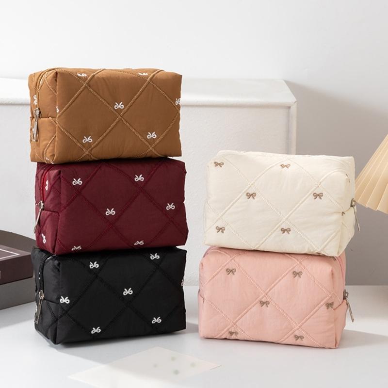 Large Capacity Makeup Organizers with Quilted Bowknot Accent and Multiple Divisions for Efficient Travel