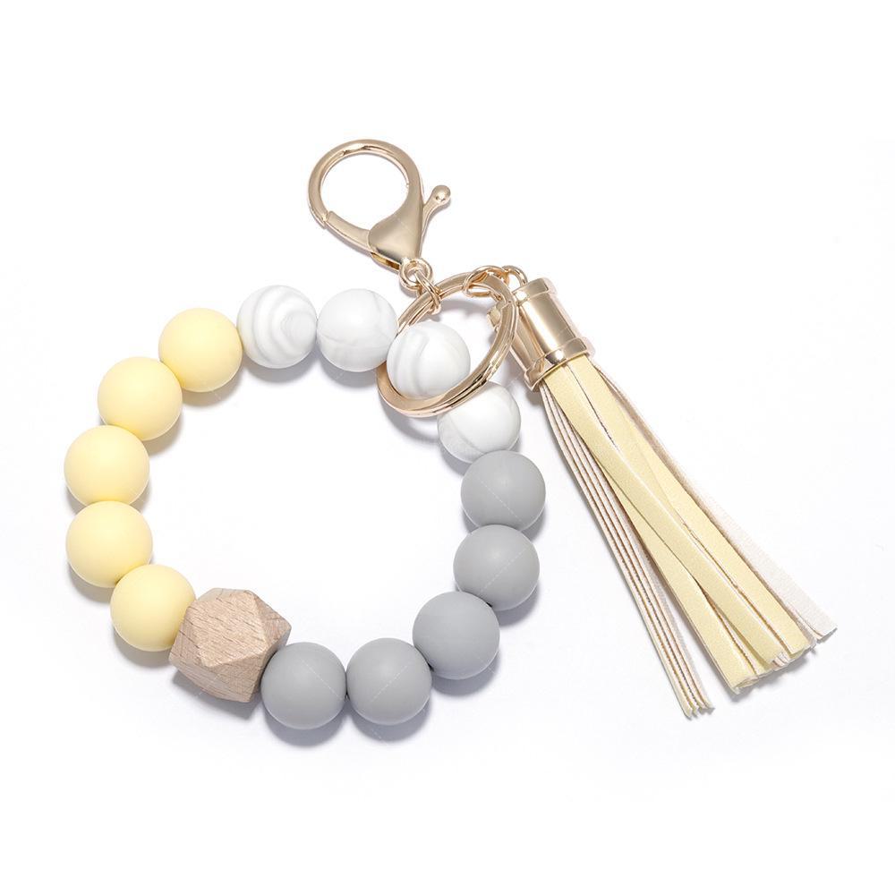 Elegant Silicone Bead Keychain Bracelet with Leather Tassel - Women's European and American Style