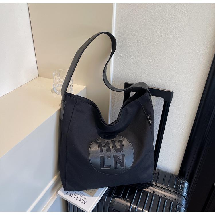 

Casual niche canvas bag women s large-capacity fashion new simple shoulder bag versatile casual tote messenger bag чёрный