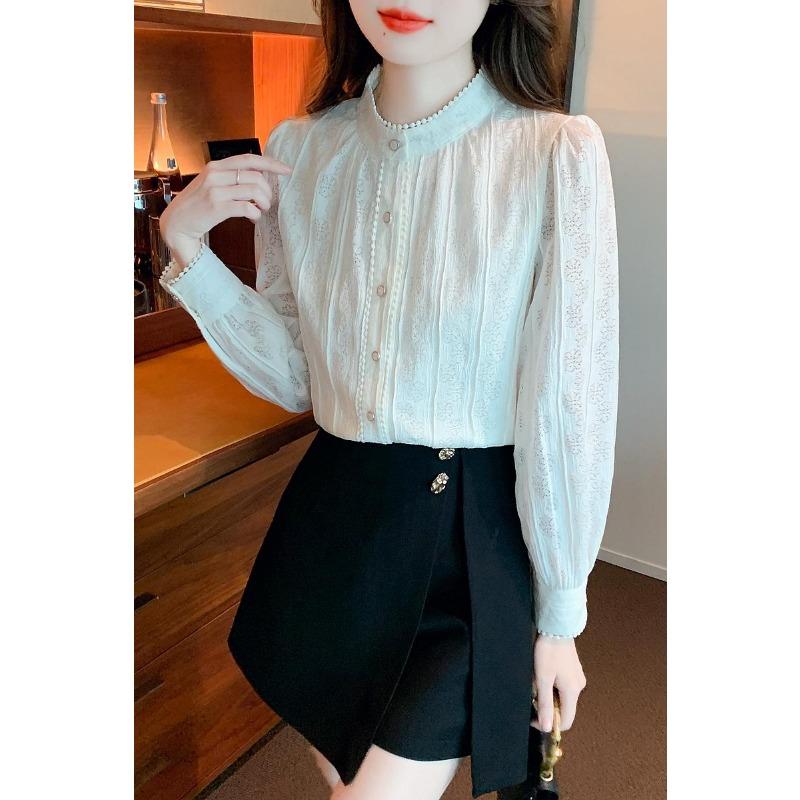 Elegancka i wyszczuplająca koronkowa bluzka w koreańskim stylu z bufiastymi rękawami i stójką