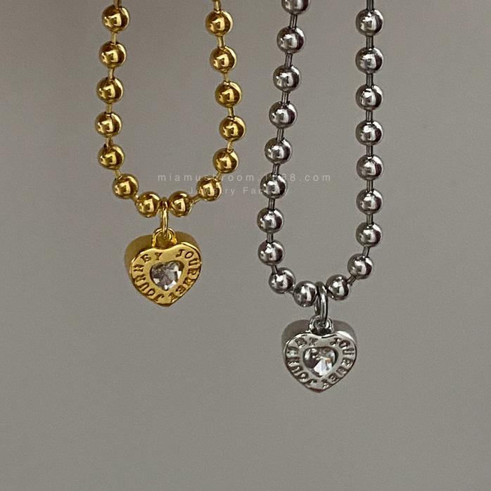 

Сладкое минималистичное колье-чокер с подвеской-сердечком в стиле Y2K - корейский дизайн для женщин