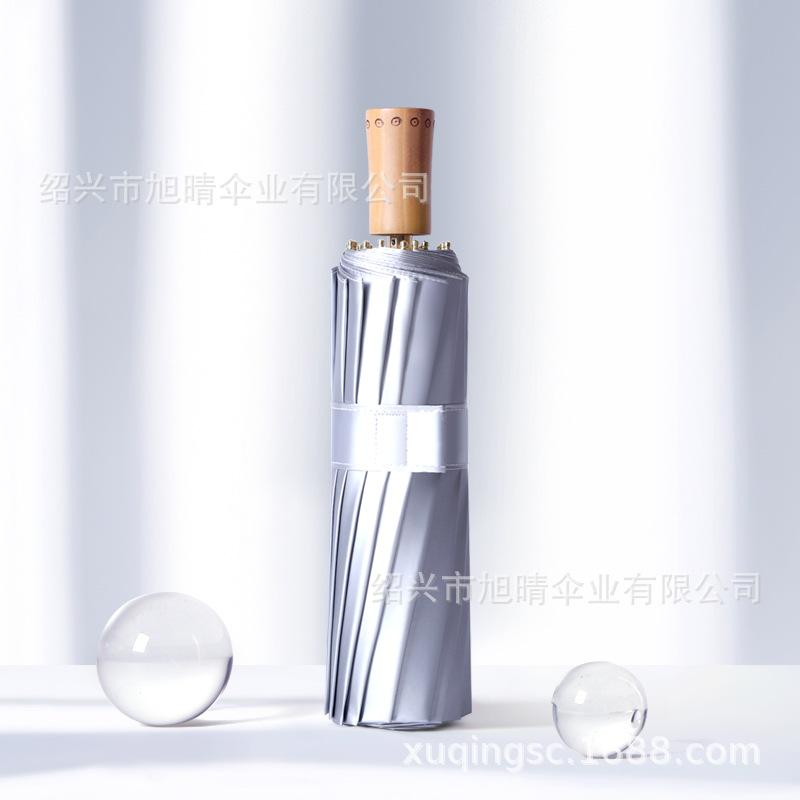 16 bone titanium silver folding umbrella, three-fold retro wood handle sun protection and UV protection dual-purpose sun umbrella
