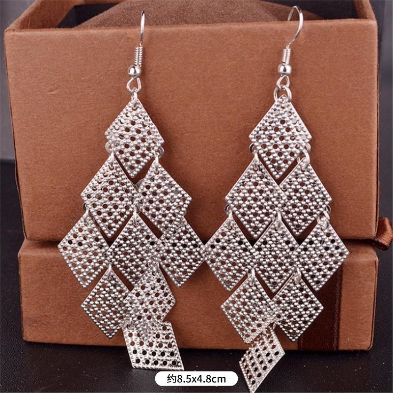 Fashion exaggerated niche temperament fringed earrings retro personality versatile sequined earrings women's long ear jewelry