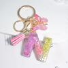 New Sparkling Sequin Initial Keychain with Butterfly Tassel & Crystal Accents