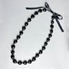 Collana di noci di kukui - Laurea Classe 2023 - Ghirlanda di noci con perline nere e fiocco - Regalo di laurea - Accessorio per feste