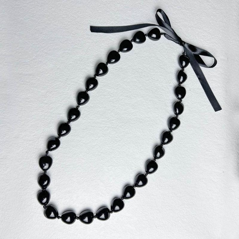 Collana di noci di kukui - Laurea Classe 2023 - Ghirlanda di noci con perline nere e fiocco - Regalo di laurea - Accessorio per feste
