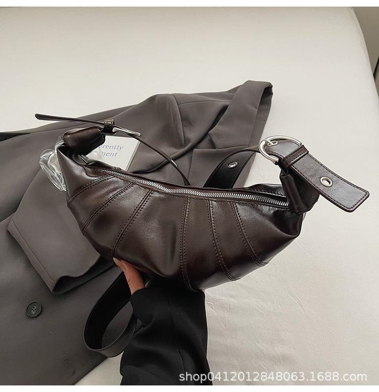 

Niche light luxury solid color soft leather underarm bag women s 2025 early spring new simple and fashionable versatile shoulder messenger bag