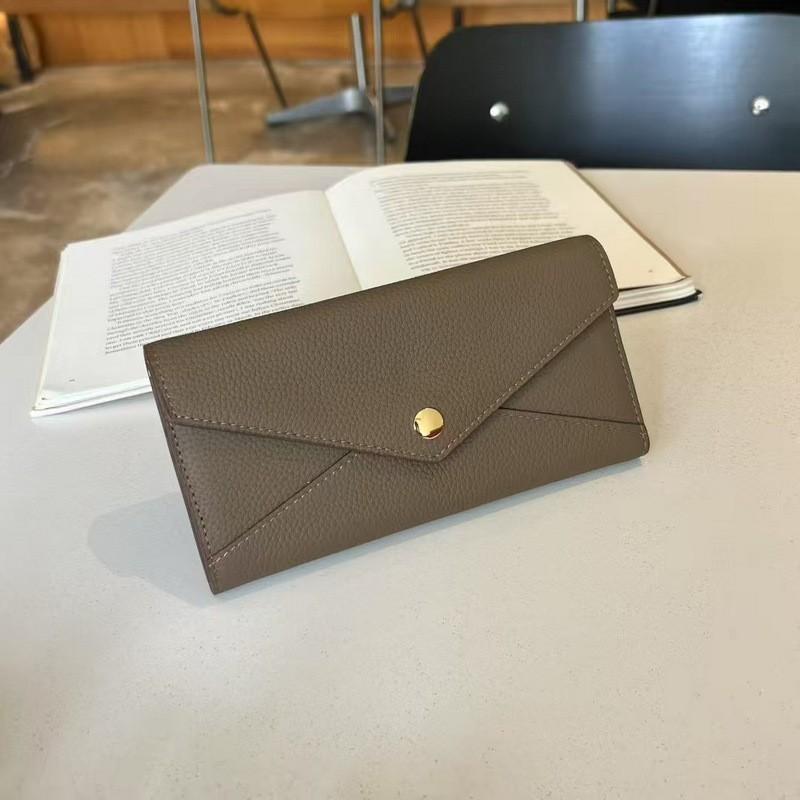 Genuine Leather Wallet. First Layer Cowhide Lychee Pattern Envelopes Spliced With Contrasting Colors. Long Three-fold Wallet