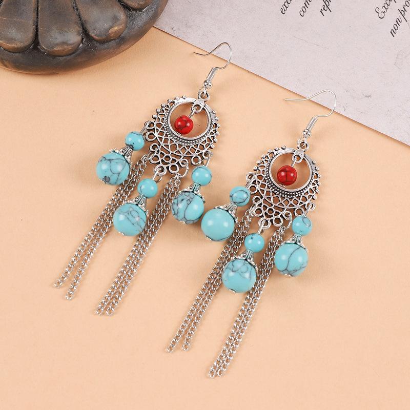 Turquoise fringed earrings women's exotic Tibetan long retro personalized earrings Chinese antique earrings