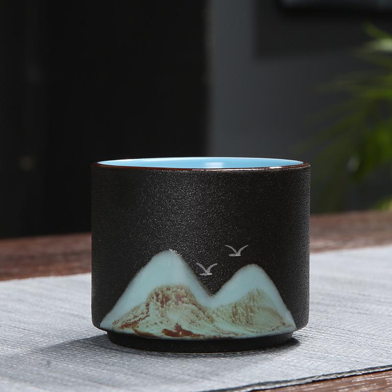 Hand-Painted Black Pottery Zen Tea Cup - Retro Mountain Design, Kung Fu Ceramic Masterpiece for Tea Tasting and Guest Reception.