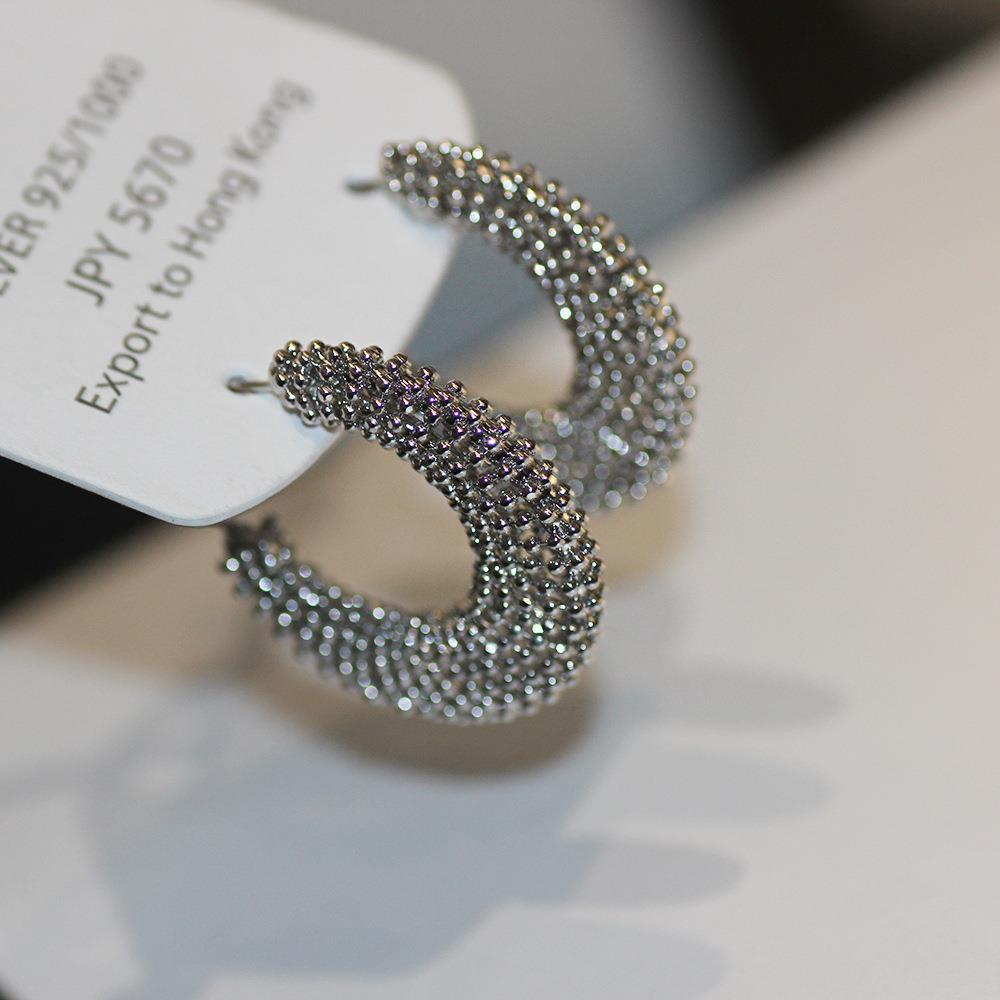 Personalized round hollow earrings fashion cold wind earrings high sense light luxury versatile earrings