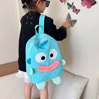 Le nouveau sac à dos mignon petite grenouille japonais est le même pour les hommes et les femmes, et le sac à dos étudiant polyvalent d'automne de grande capacité.