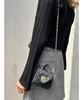 Soft quilted mini shoulder bag