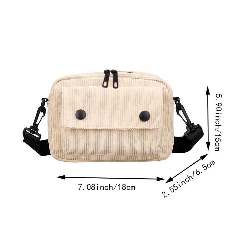 Neutral men's and women's cross-body bag with shoulder strap, made of corduroy material, with a flap design  the outside.