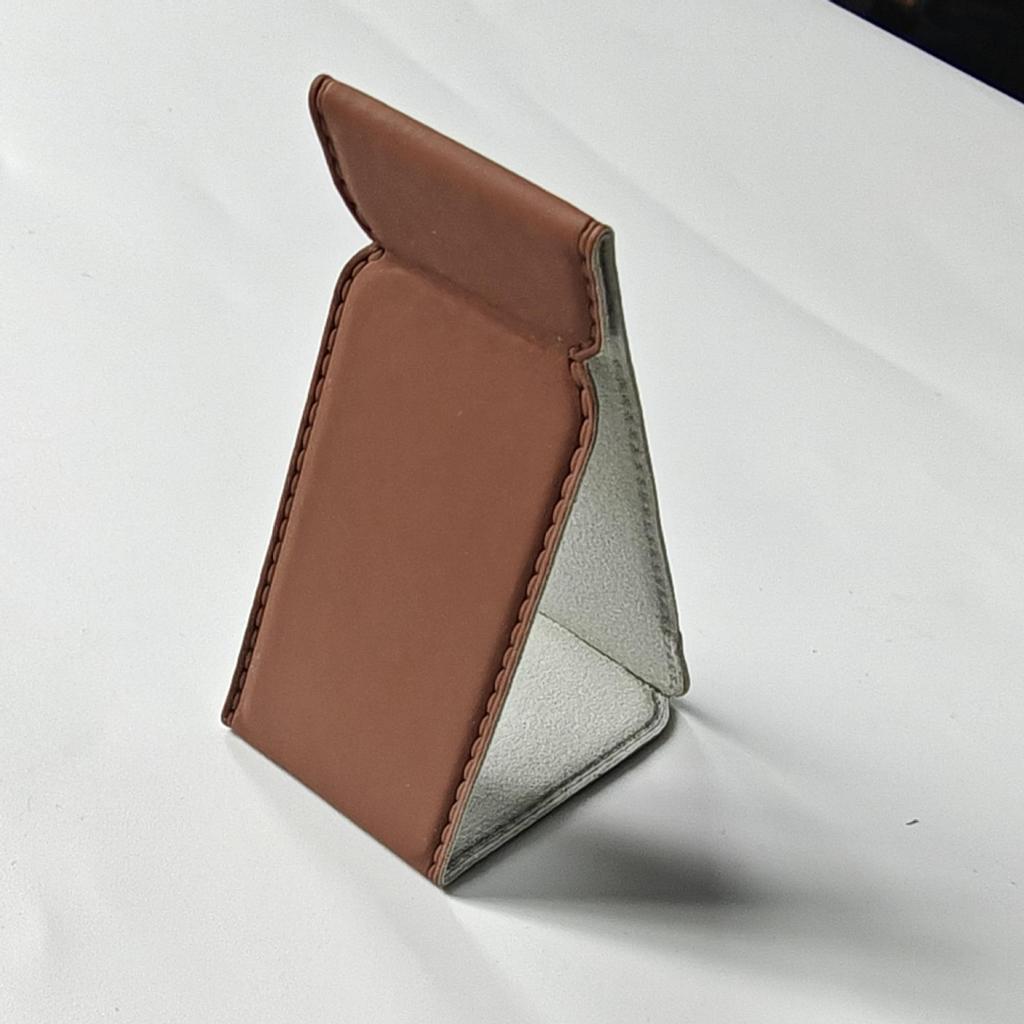 Universal PU Leather Phone Stand: Magnetic, Stick-On Holder for Foldable Android, Apple, and Huawei Devices