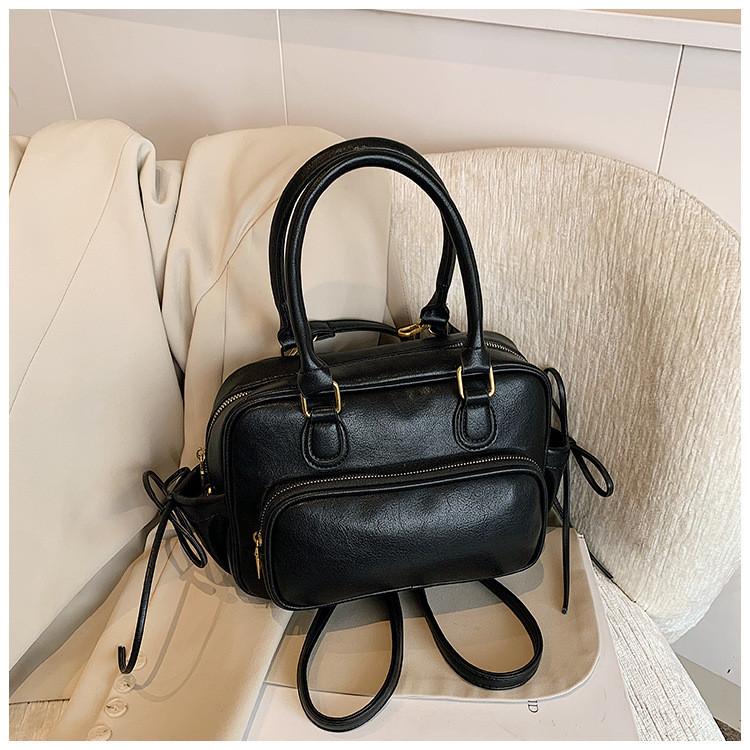 Ielgy Retro Large-Capacity Backpack Simple Commuter Preppy Style
