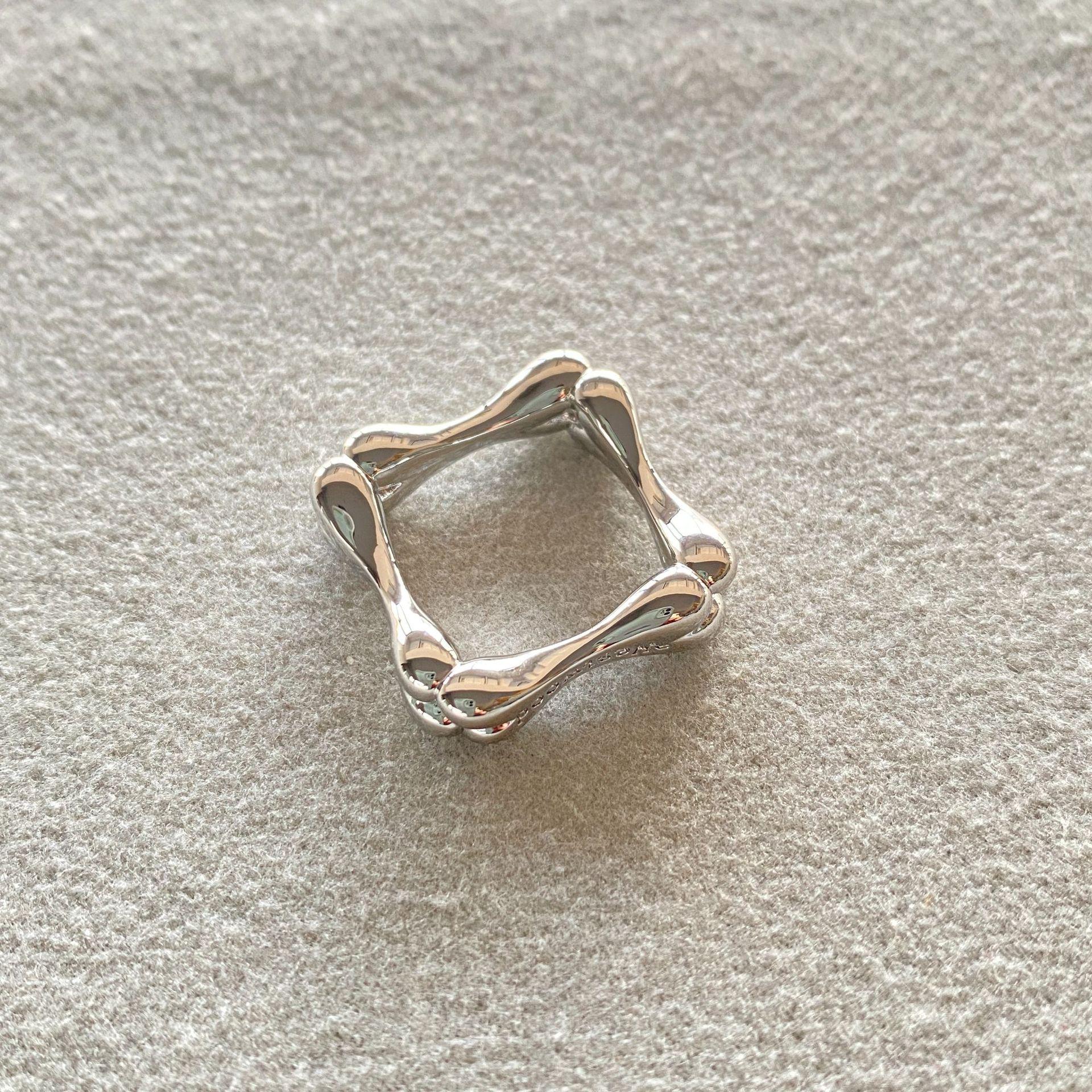 

Saturn-Inspired Irregular Abstract Women s Ring: Chic, Textured, Criss-Cross Design