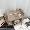 Schoolbag messenger bag women's 1011 new fashion tooling large-capacity messenger bag men's casual versatile student class shoulder bag