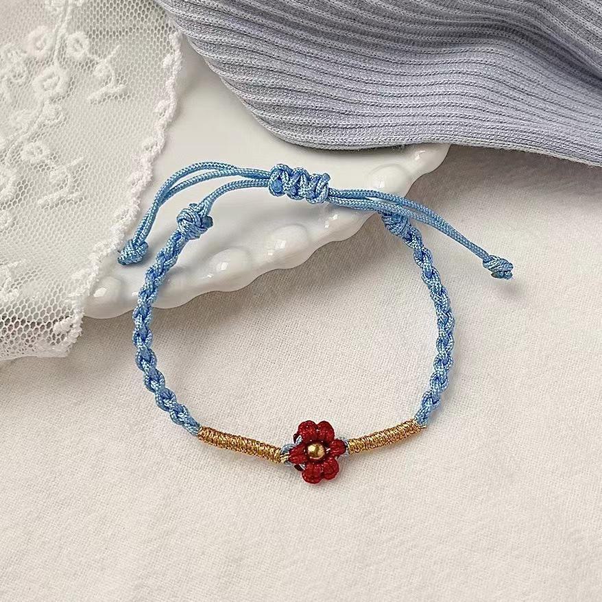Yi Yangqianxi's Red Flower Hand-Woven Ethnic Bracelet for Women