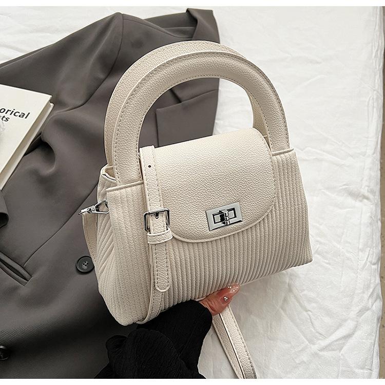 

2025 new striped simple messenger bag niche design shoulder bag trendy women s elegant portable diagonal straddle bag белый