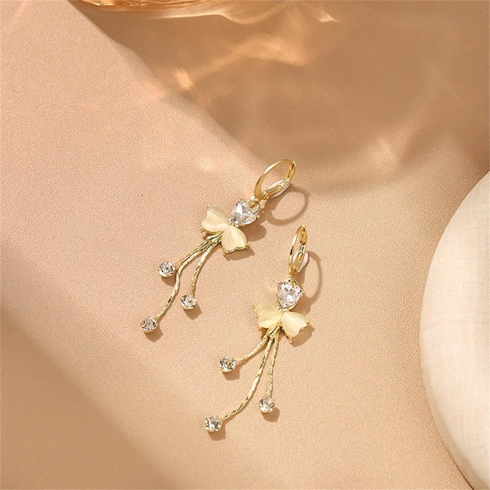 New Light Luxury Three Leaf Clover Ear Buckle with Advanced Sense Cat Eye Stone Tassel Unique Four Leaf Clover Earrings