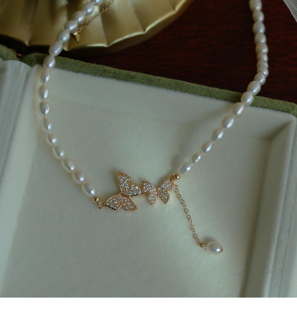 

Позолоченное колье-чокер с жемчугом и бабочкой