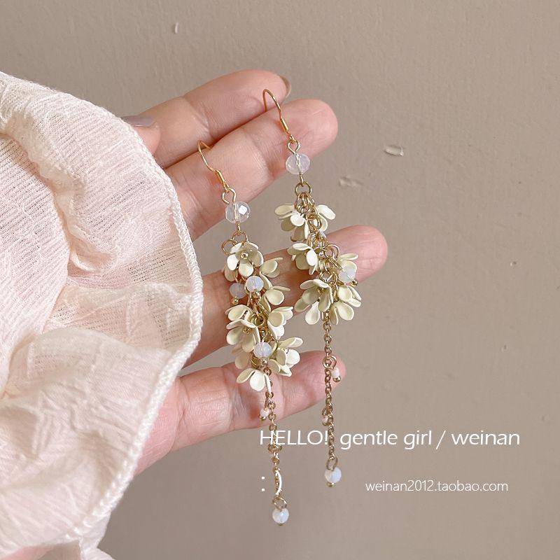 

Summer Long Fringe Seaside Southeast Asia Mosquito Coil Ear Clip Pair of white ear hooks