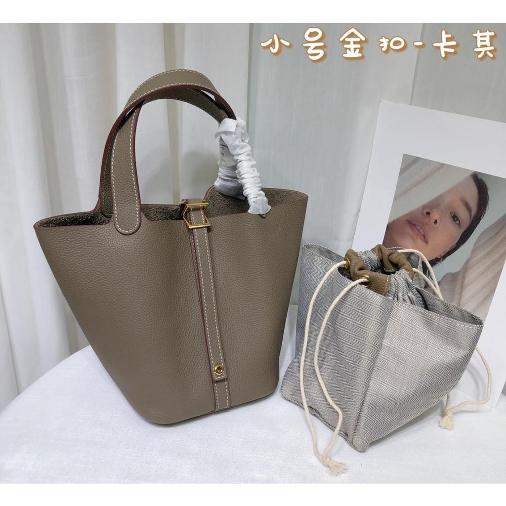 Spot wholesale top layer cowhide vegetable basket bag leather bucket bag commuter fashion lock buckle hand-held handbag woman