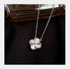 Gold-Plated Nickel Silver Four-Leaf Clover Necklace with Laser Engraved Double-Sided Pendant