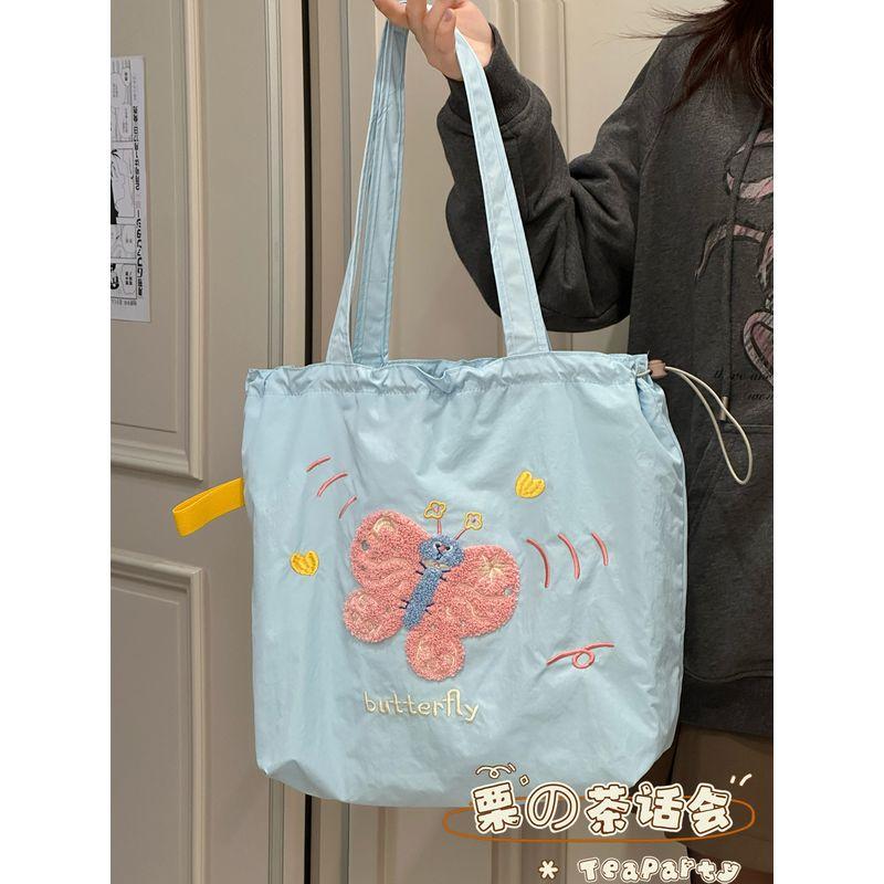 

Японская мода Ins Большая вместительная сумка через плечо Женская легкая дорожная сумка-тоут Студенческая повседневная сумка-мессенджер Портативная холщовая сумка Flying butterfly