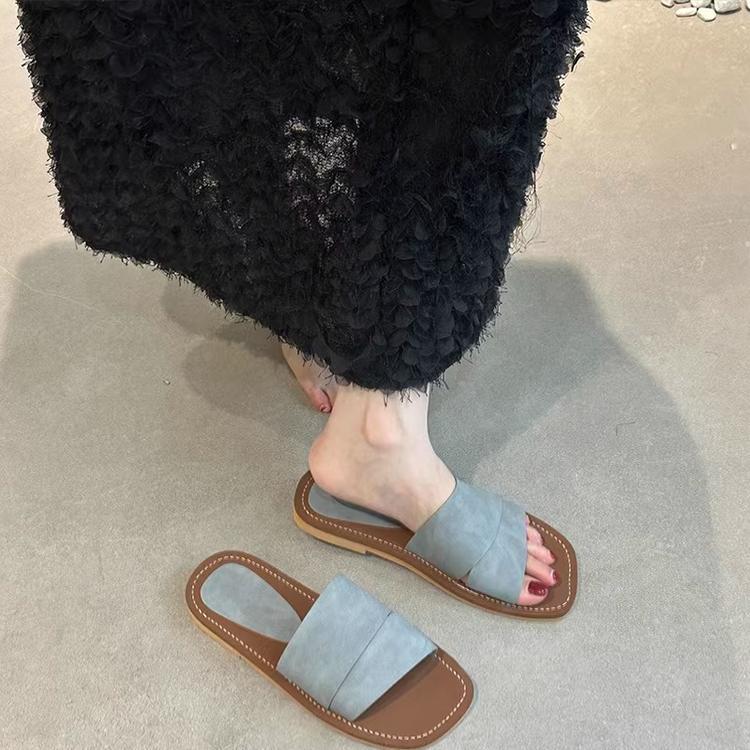 Sheepskin one-word slippers women's summer wear Korean version French evening breeze with skirt temperament soft leather flat-bottomed cool slippers