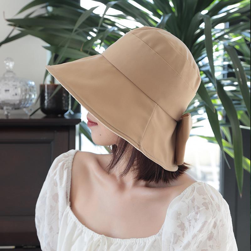 Sunscreen hat women's spring and summer UV protection sunshade bucket hat bow British eaves elegant versatile sun hat
