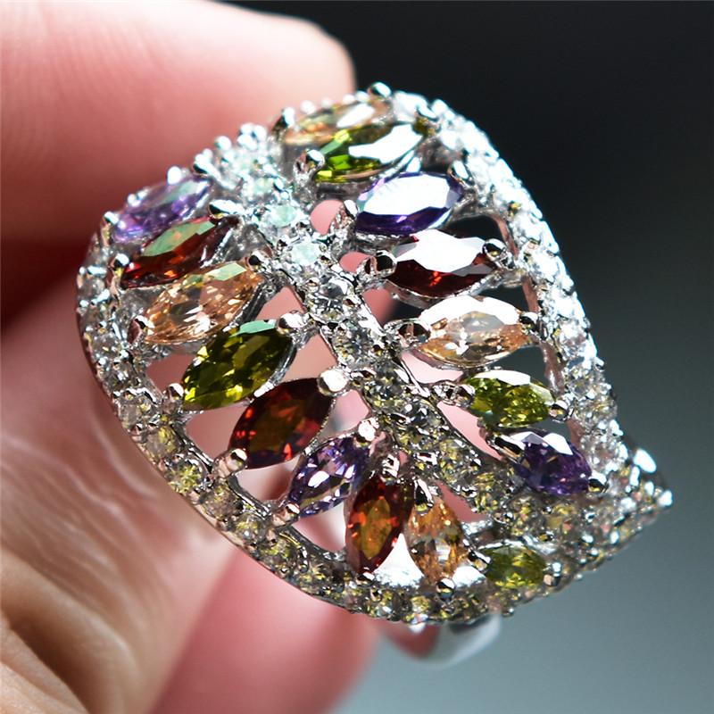 

Кольцо с огранкой «маркиз» красного, фиолетового, шампанского, оливкового, зеленого цвета, с фианитами в форме листа, серебряного цвета, многоцветное, с камнями-талисманами 9 разноцветный