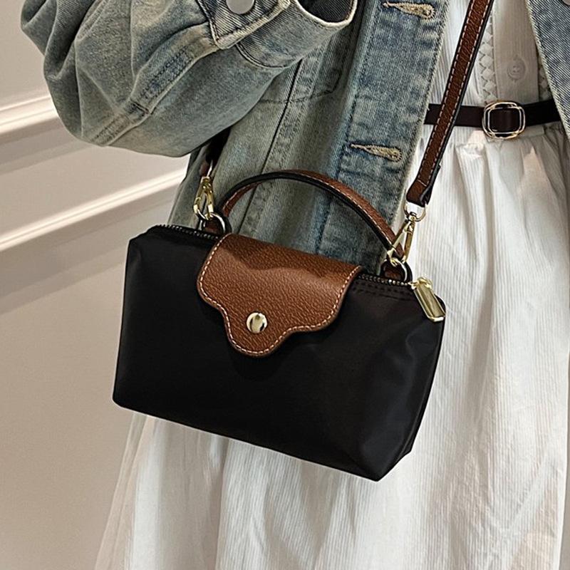 Wholesale new products niche simple contrasting color portable small bag women's leisure trendy versatile light splicing messenger change bag