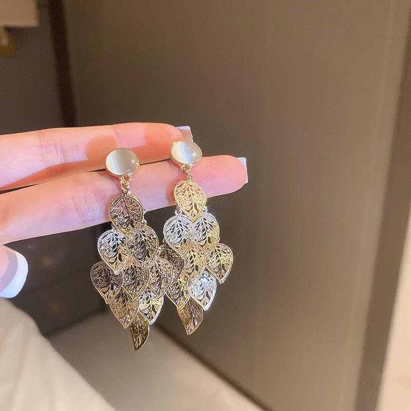 Silver Needle Geometric Openwork Round Pendant Earrings with European and American Exaggerated Style for Women.