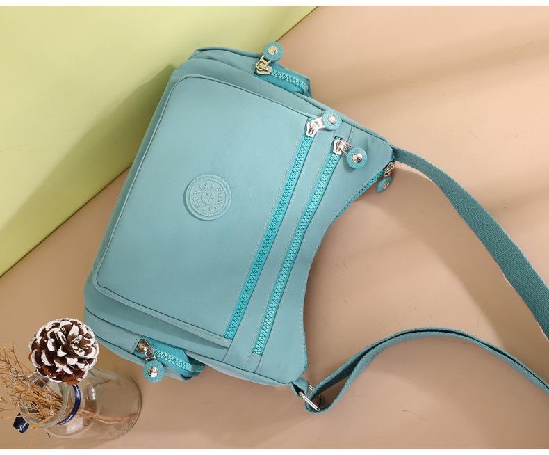 Stylish Mid-Aged Women’s Waterproof Nylon Crossbody Bag with Multiple Compartments