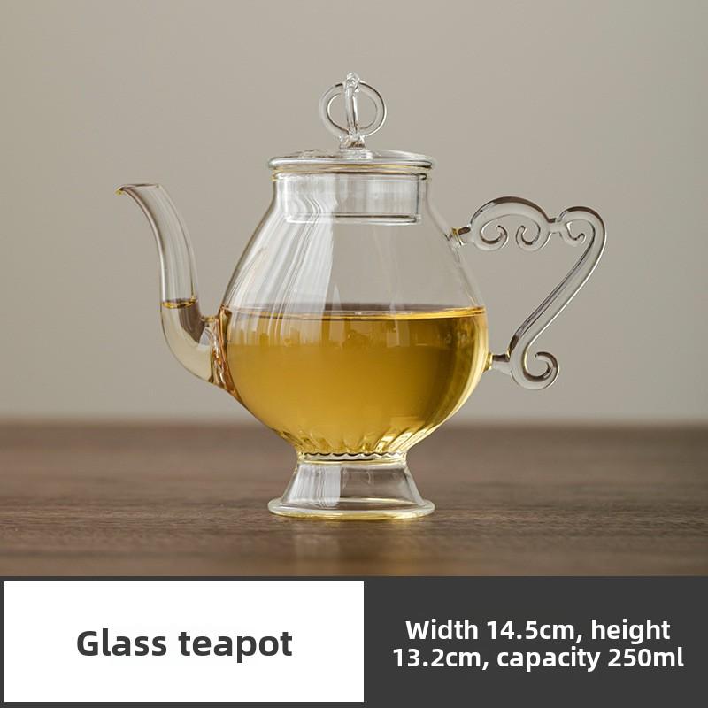 Vintage handgjord tekanna i glas, tekopp i högt borosilikatglas, rättvis kopp, redskap för eftermiddagste