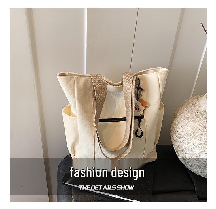 Women's Large Canvas Tote: College Style, Casual Shoulder Bag with Ample Storage