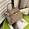 Borsa Kelly portatile con texture primaverile nuova borsa a spalla versatile borsa messenger retrò da donna