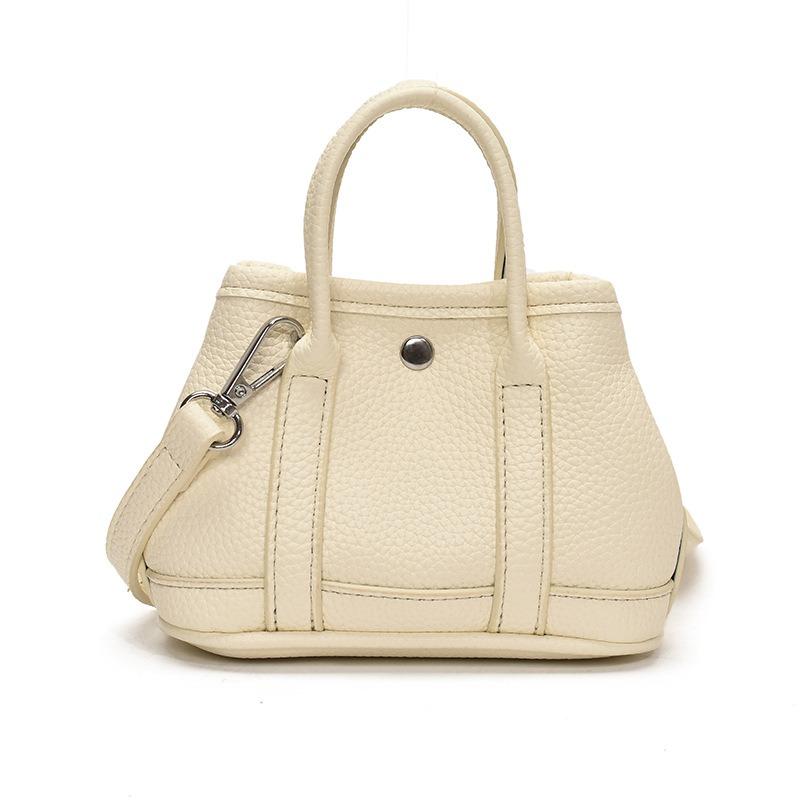 

Fashion contrasting splicing niche portable bucket bag fashion commuting versatile single shoulder messenger bag women