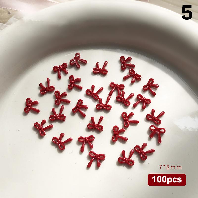 100 Stück 3D Nail Art Rote Schleifen Anhänger Kawaii Harz Zubehör für Maniküre Dekorationen 10 Stück pro Set Nail Art Zubehör