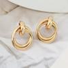 Gold-Tone Geometric Twist Earrings: Fashionable and Versatile Multi-Layer Braided Earrings for Women.