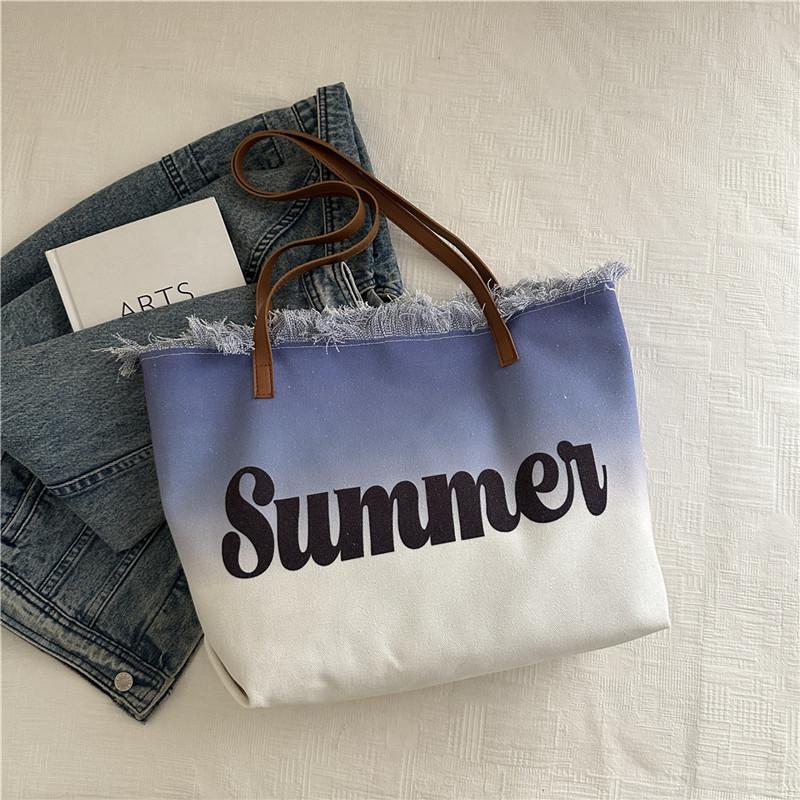 New large-capacity fringed bag beach bag women's shoulder tote bag is now popular casual bag popular women