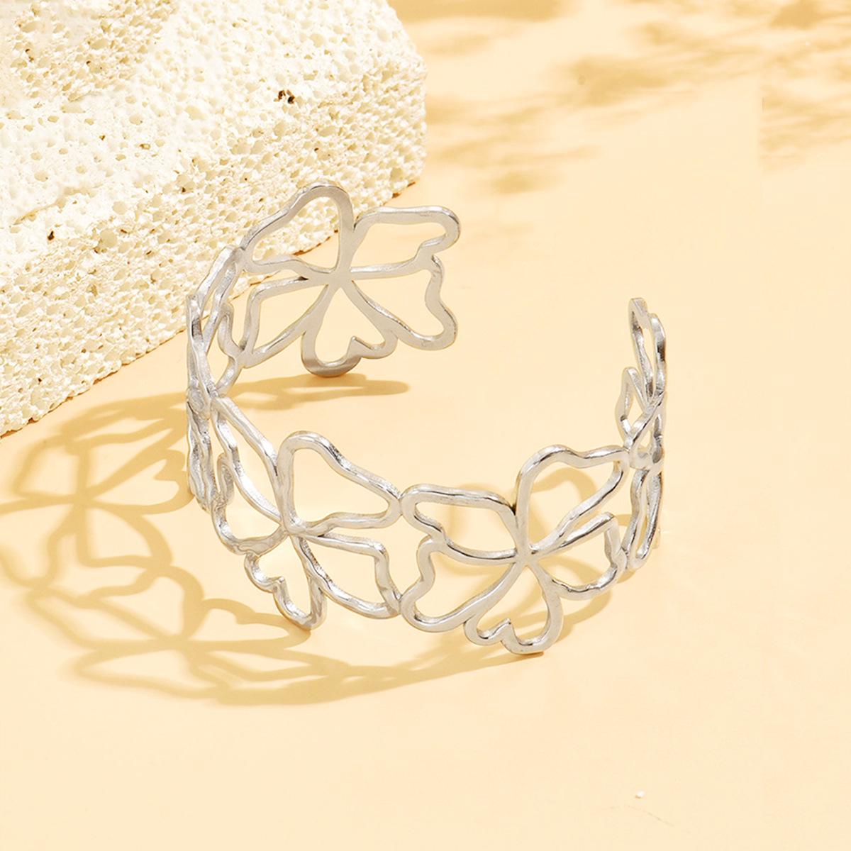 Stainless Steel Gold-Plated Hollow Flower Cuff Bracelet for Women